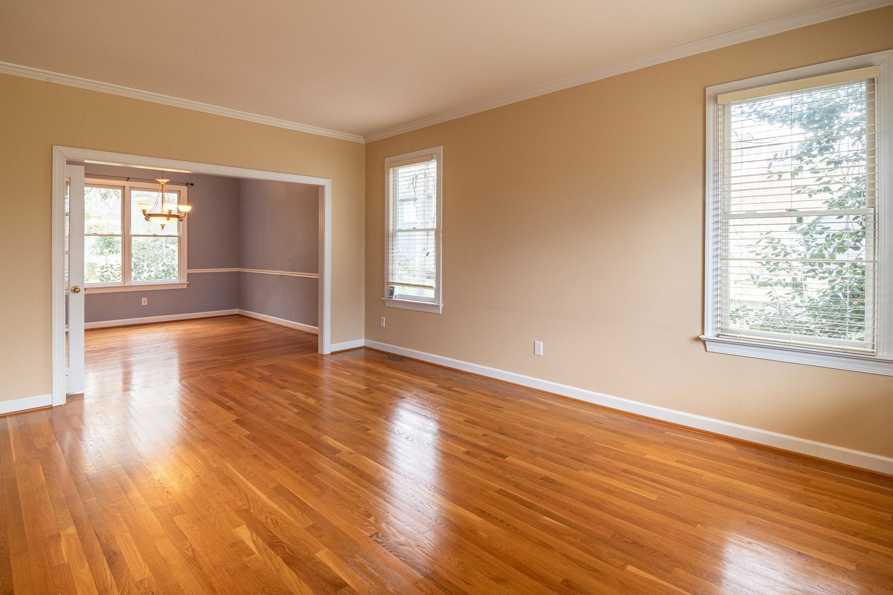 Clean room with a finished natural hardwood floor